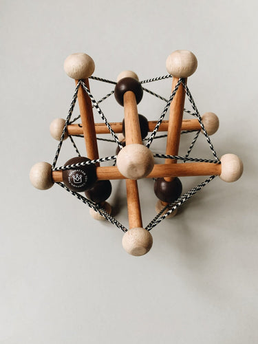 Skwish Rattle in Dark Brown from Manhattan Toy Company